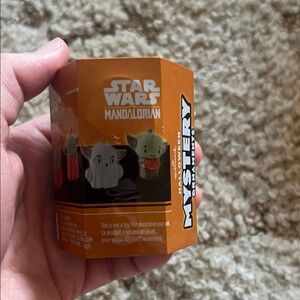 Hallmark Star Wars Mandalorian Mystery Ornament - Orange and Black